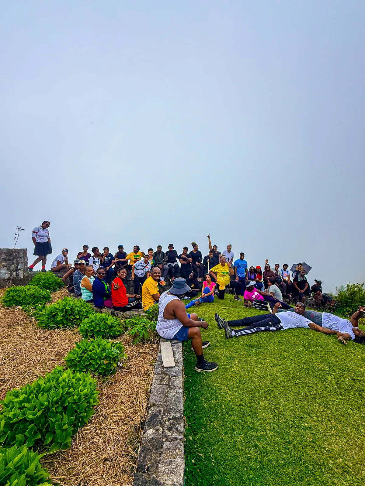 Hikers resting on the Cinchona Botanical Gardens route