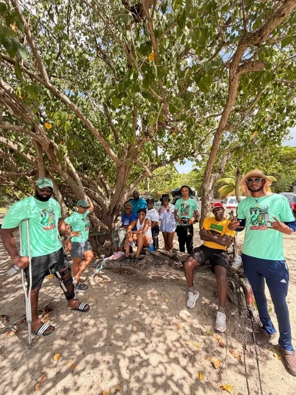 Lifestyle Hikers members resting under a tree at Rocky Point during the coastal cleanup